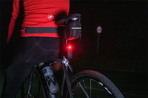 Rider setting off with Garmin varia rear radar light